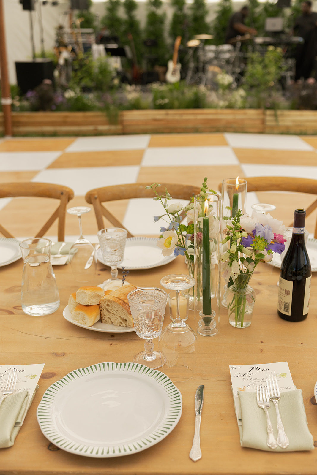 Checkerboard tabletop with wildflower centerpieces