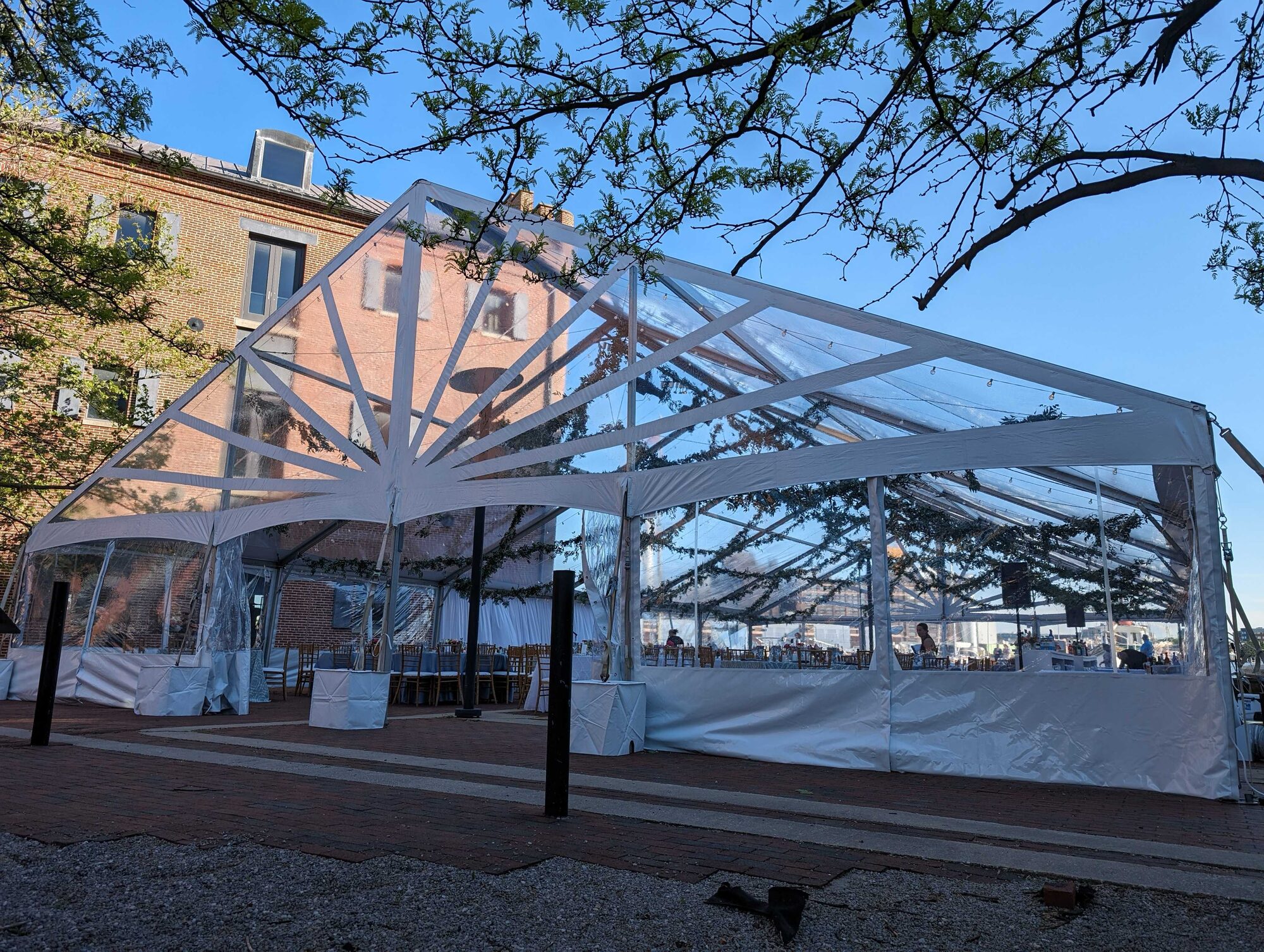 Clear-top frame tent at dusk
