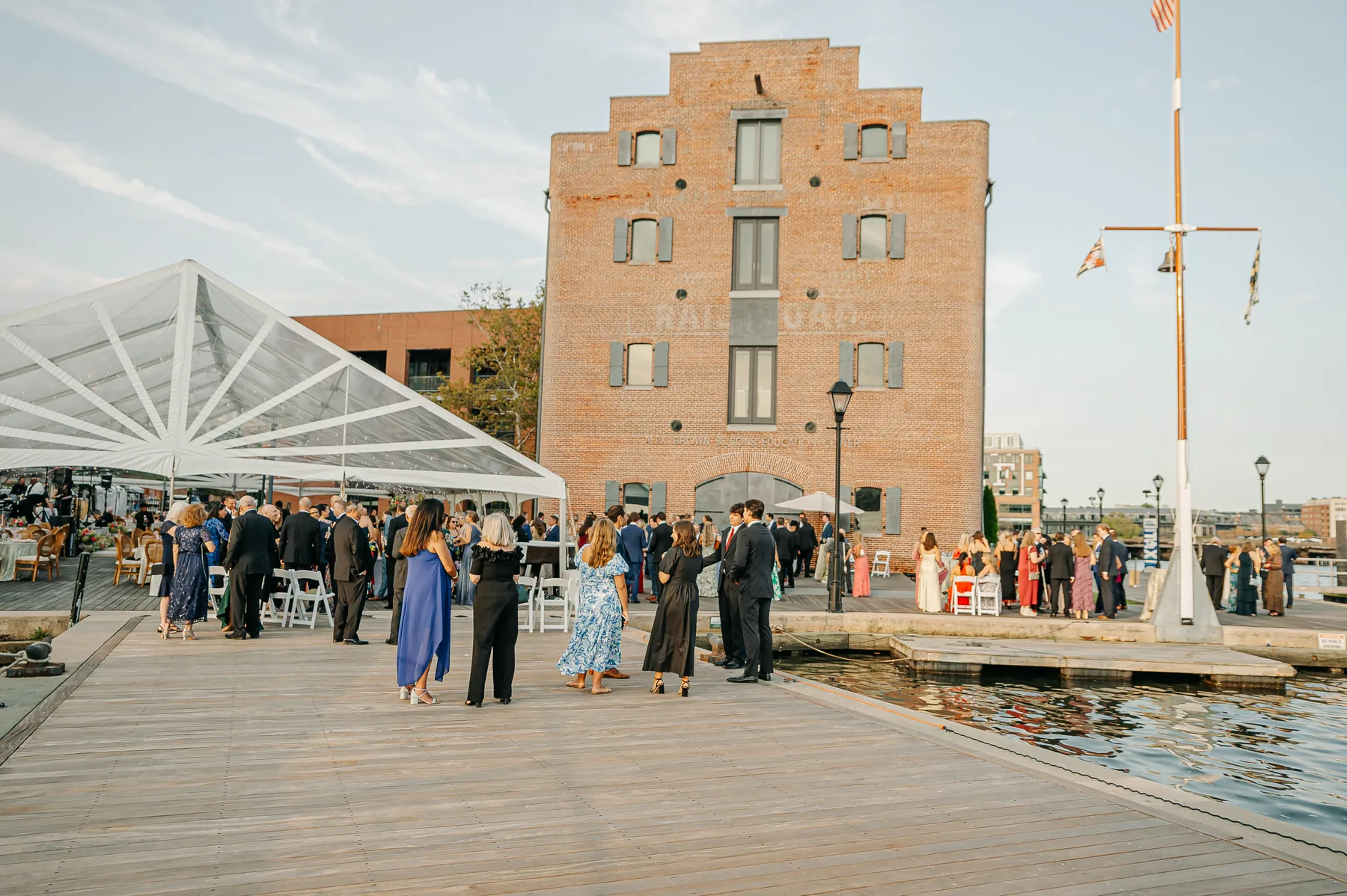 Clear-top event tent beside the waterfront