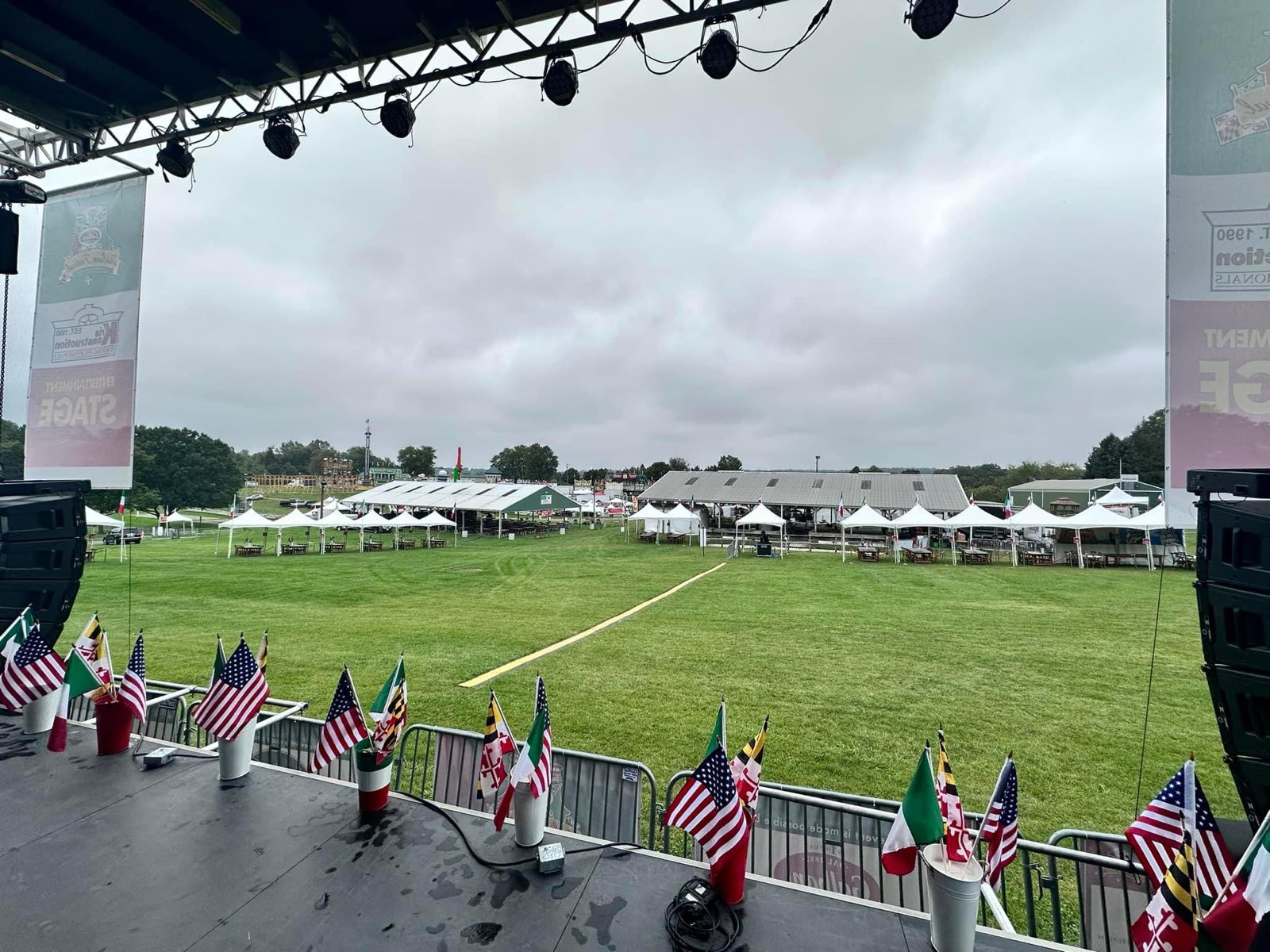 Festival stage draped with flags
