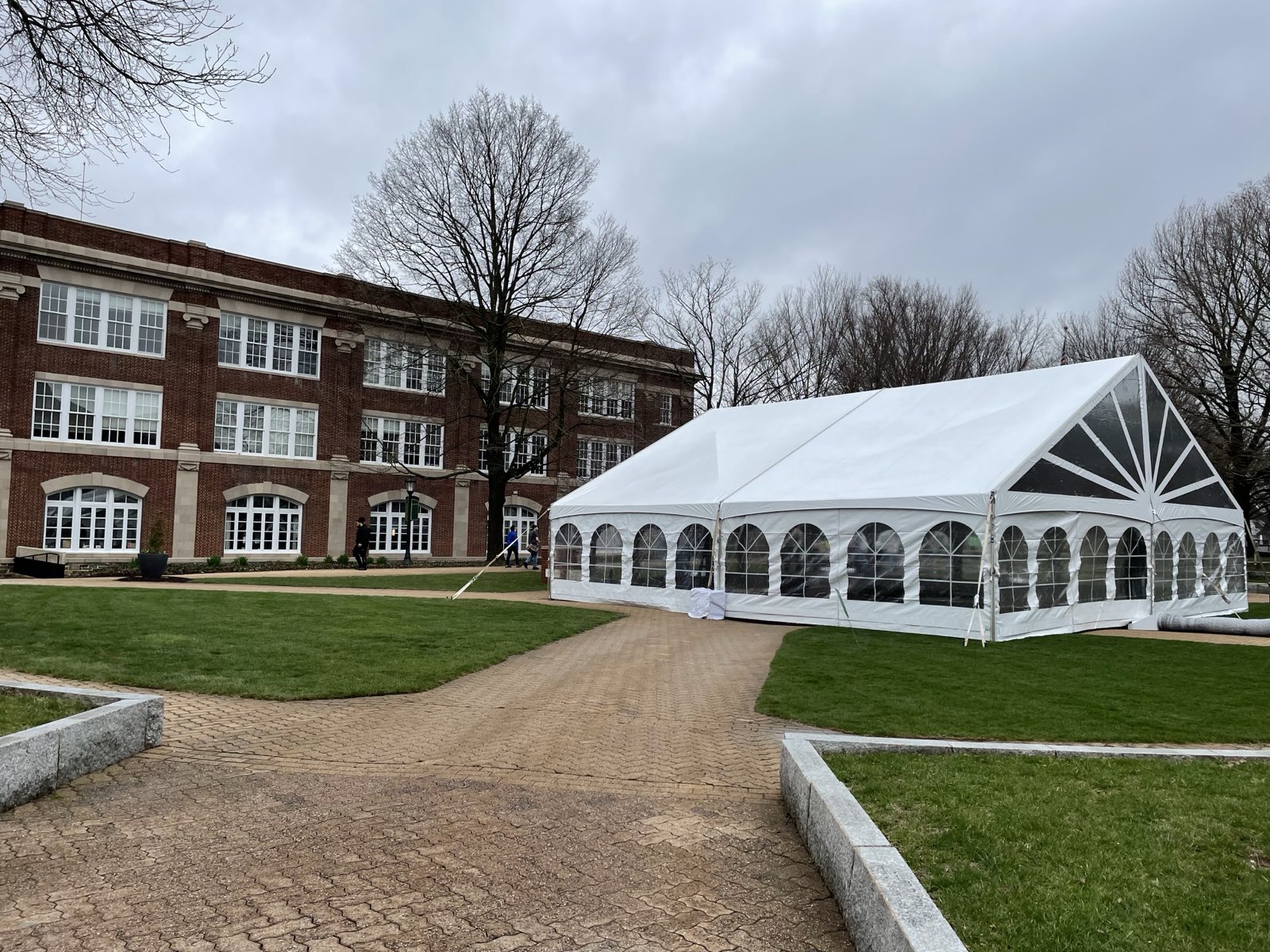 Frame tent with cathedral windows at a school campus event