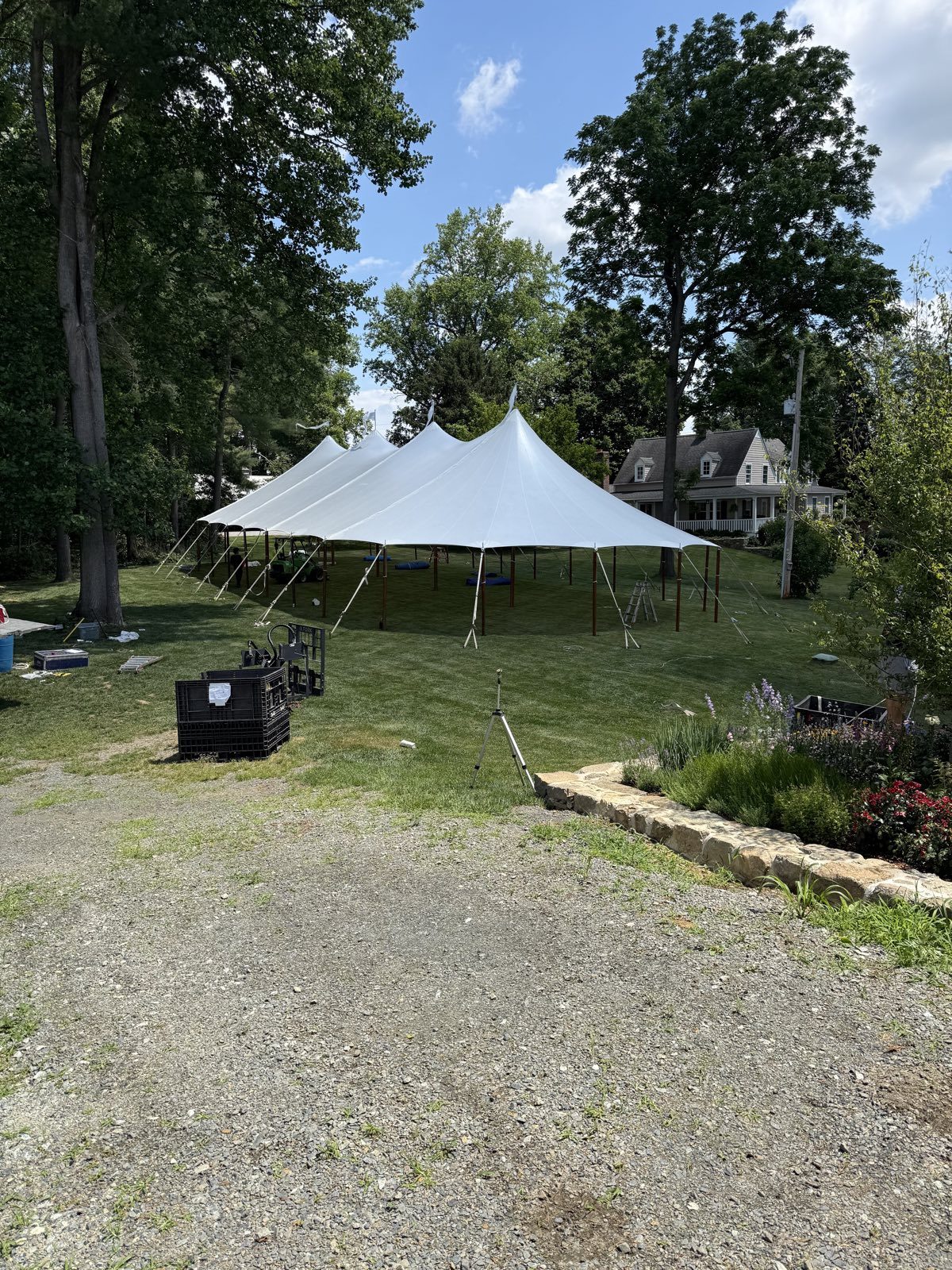 Sailcloth tent tucked into a garden setting
