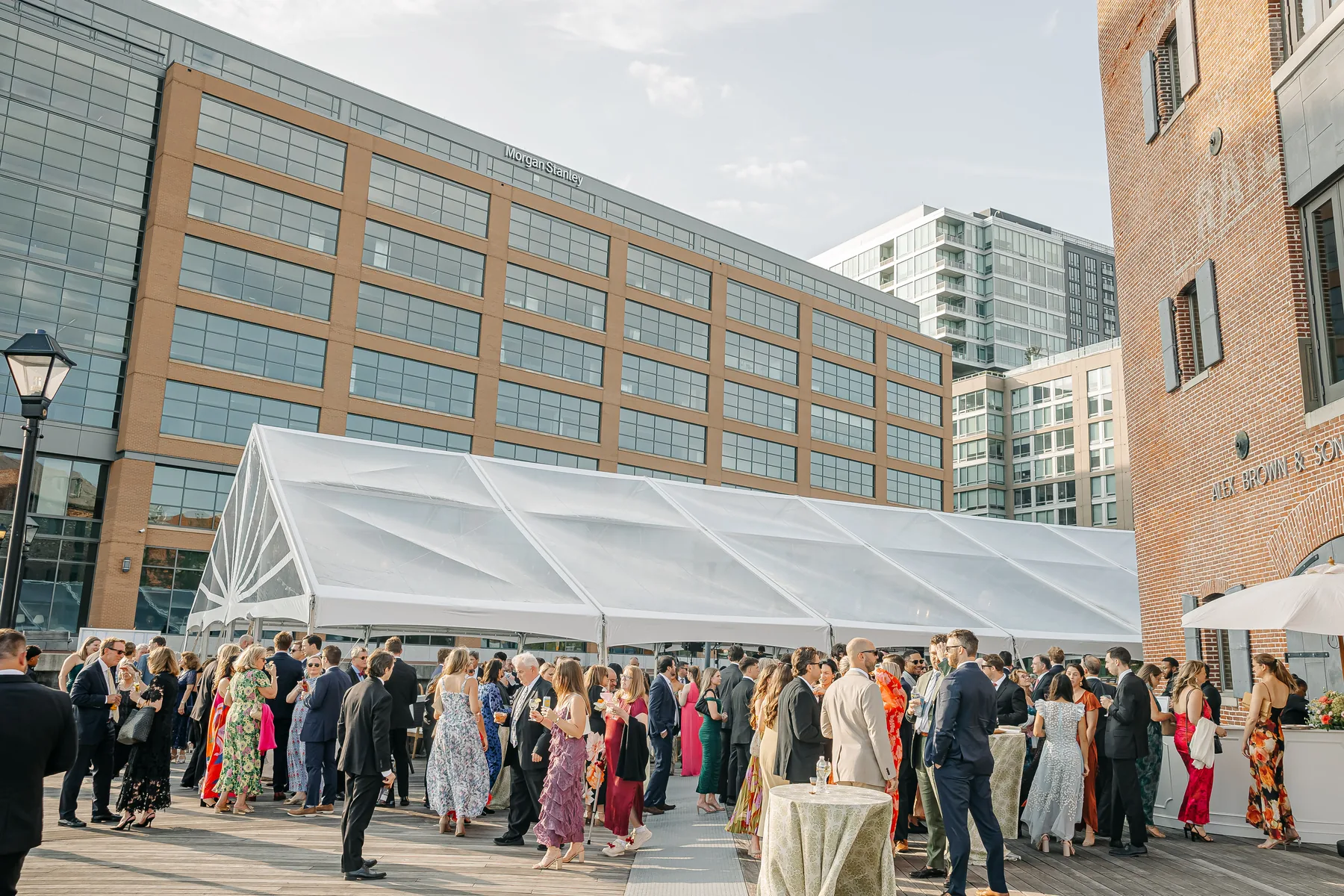 Clear-top event tent beside the waterfront