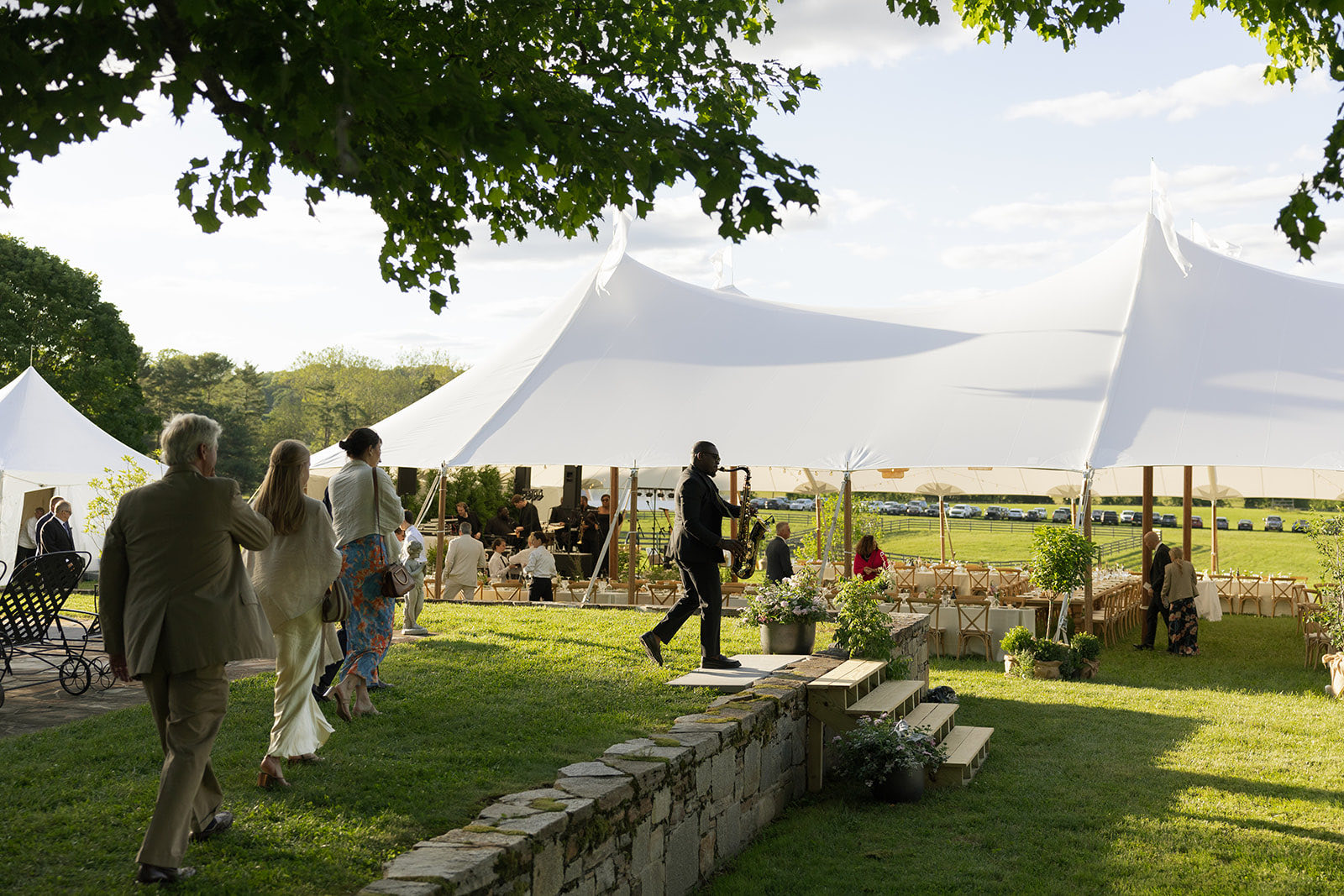 Wedding guests arriving at dusk